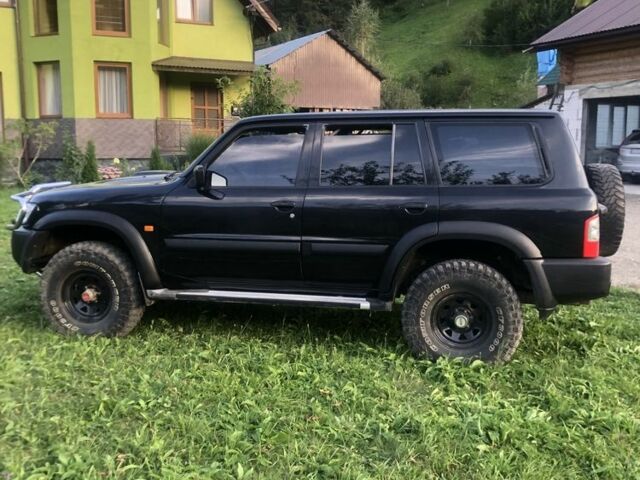 Черный Ниссан Патрол, объемом двигателя 3 л и пробегом 130 тыс. км за 17700 $, фото 2 на Automoto.ua