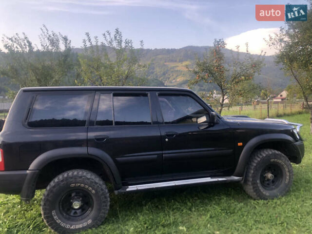Черный Ниссан Патрол, объемом двигателя 3 л и пробегом 130 тыс. км за 19700 $, фото 2 на Automoto.ua