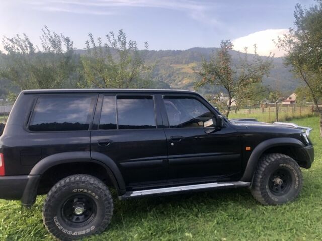 Черный Ниссан Патрол, объемом двигателя 3 л и пробегом 130 тыс. км за 17700 $, фото 1 на Automoto.ua