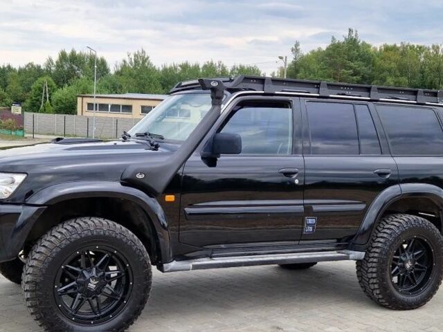Черный Ниссан Патрол, объемом двигателя 3 л и пробегом 290 тыс. км за 3750 $, фото 1 на Automoto.ua