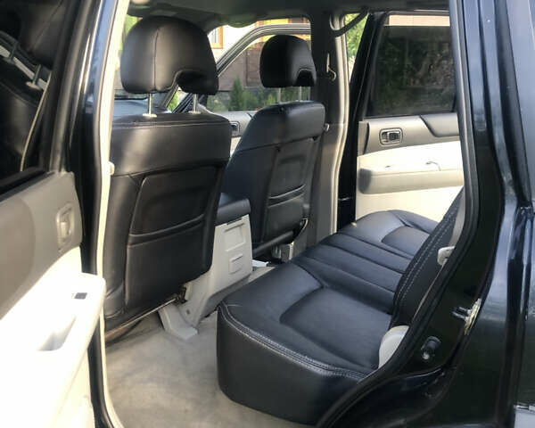 Черный Ниссан Патрол, объемом двигателя 3 л и пробегом 130 тыс. км за 19700 $, фото 6 на Automoto.ua