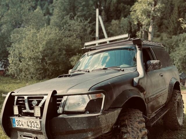 Черный Ниссан Патрол, объемом двигателя 3 л и пробегом 300 тыс. км за 6500 $, фото 4 на Automoto.ua