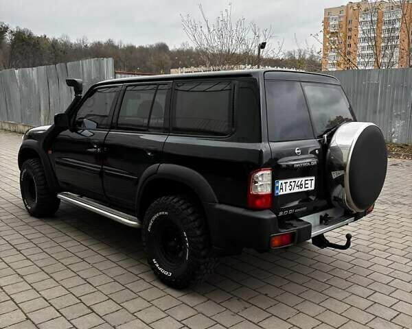 Черный Ниссан Патрол, объемом двигателя 3 л и пробегом 276 тыс. км за 22500 $, фото 1 на Automoto.ua