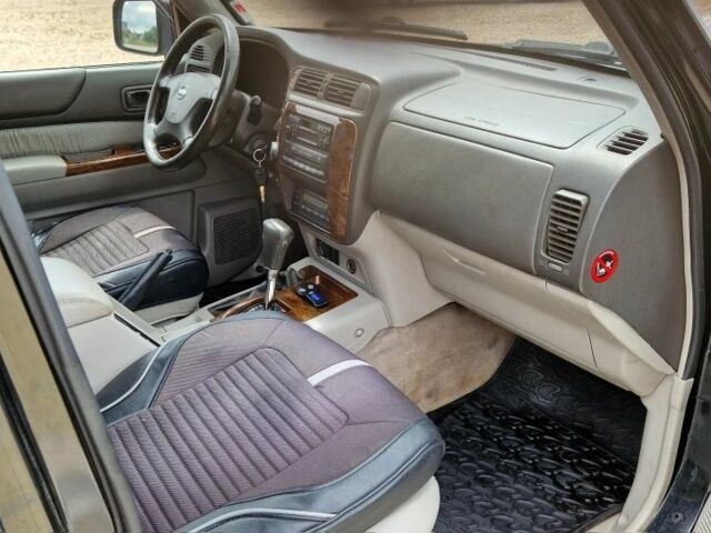 Черный Ниссан Патрол, объемом двигателя 3 л и пробегом 290 тыс. км за 3750 $, фото 5 на Automoto.ua