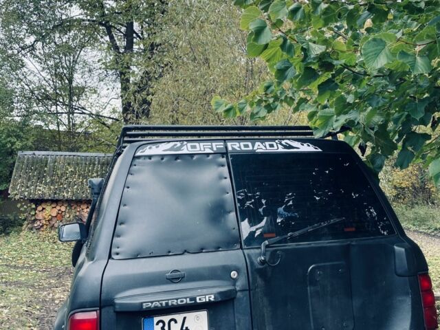 Черный Ниссан Патрол, объемом двигателя 3 л и пробегом 300 тыс. км за 6800 $, фото 4 на Automoto.ua