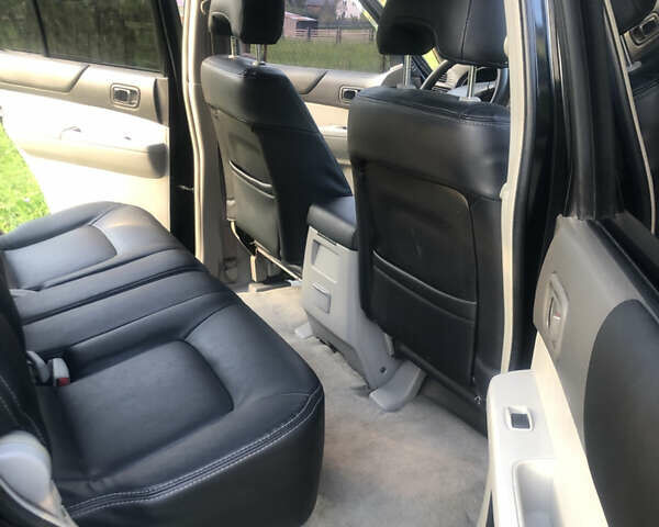 Черный Ниссан Патрол, объемом двигателя 3 л и пробегом 130 тыс. км за 19700 $, фото 7 на Automoto.ua