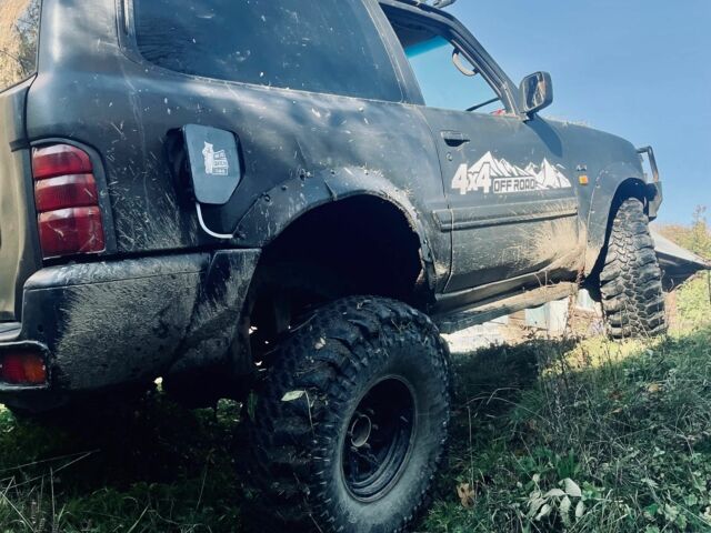 Черный Ниссан Патрол, объемом двигателя 3 л и пробегом 300 тыс. км за 6800 $, фото 2 на Automoto.ua