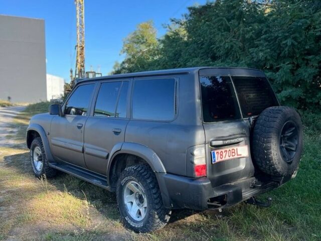 Чорний Ніссан Патрол, об'ємом двигуна 3 л та пробігом 1000 тис. км за 5900 $, фото 3 на Automoto.ua