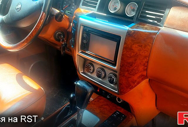 Чорний Ніссан Патрол, об'ємом двигуна 3 л та пробігом 232 тис. км за 12700 $, фото 6 на Automoto.ua
