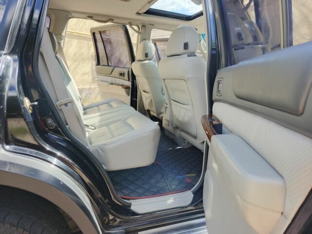 Чорний Ніссан Патрол, об'ємом двигуна 3 л та пробігом 3 тис. км за 19000 $, фото 4 на Automoto.ua