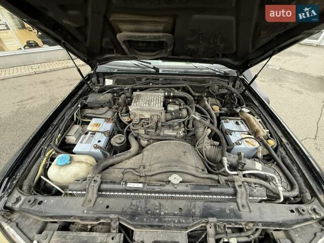 Черный Ниссан Патрол, объемом двигателя 3 л и пробегом 359 тыс. км за 18999 $, фото 23 на Automoto.ua