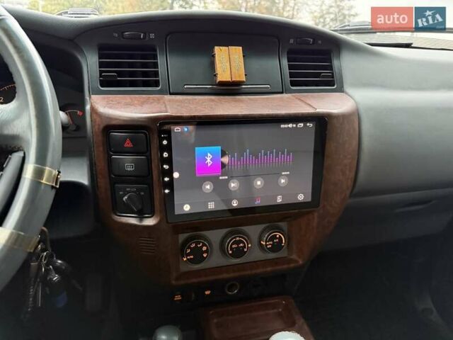 Черный Ниссан Патрол, объемом двигателя 3 л и пробегом 359 тыс. км за 18999 $, фото 19 на Automoto.ua