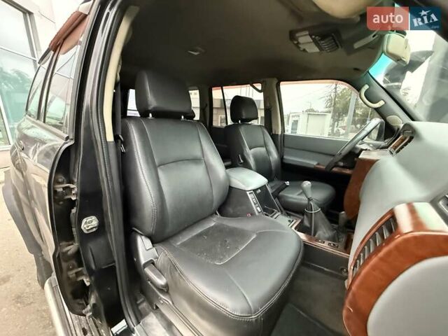Черный Ниссан Патрол, объемом двигателя 3 л и пробегом 359 тыс. км за 18999 $, фото 12 на Automoto.ua