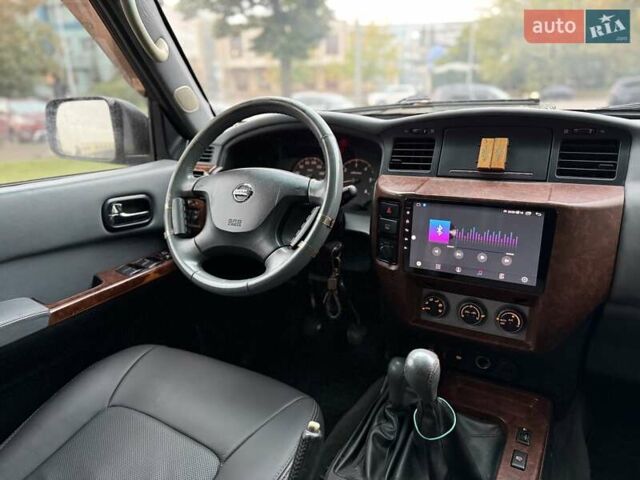 Черный Ниссан Патрол, объемом двигателя 3 л и пробегом 359 тыс. км за 18999 $, фото 9 на Automoto.ua