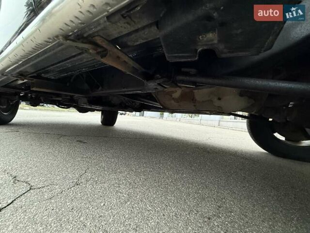 Черный Ниссан Патрол, объемом двигателя 3 л и пробегом 359 тыс. км за 18999 $, фото 27 на Automoto.ua