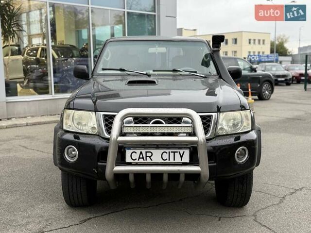 Черный Ниссан Патрол, объемом двигателя 3 л и пробегом 359 тыс. км за 18999 $, фото 1 на Automoto.ua