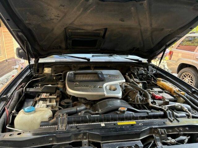 Черный Ниссан Патрол, объемом двигателя 3 л и пробегом 208 тыс. км за 20500 $, фото 4 на Automoto.ua