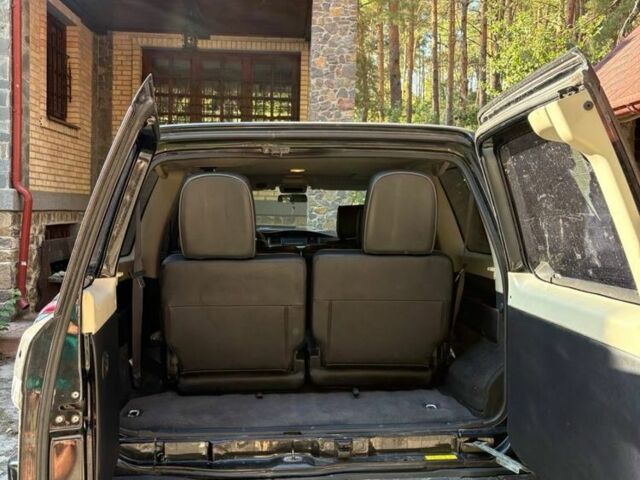 Черный Ниссан Патрол, объемом двигателя 3 л и пробегом 208 тыс. км за 20500 $, фото 2 на Automoto.ua