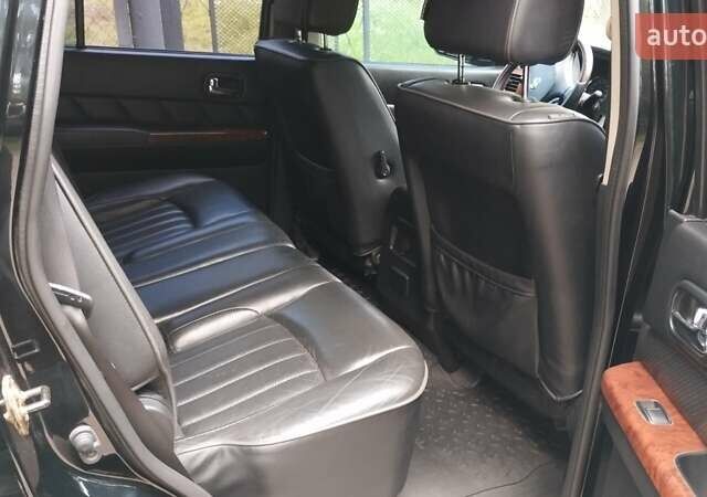 Черный Ниссан Патрол, объемом двигателя 3 л и пробегом 230 тыс. км за 23500 $, фото 6 на Automoto.ua