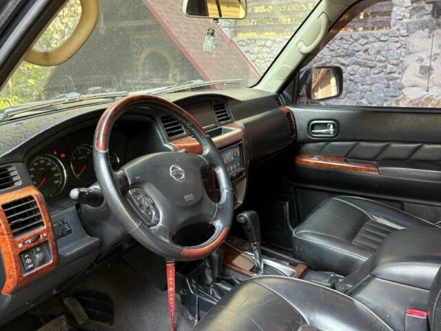 Черный Ниссан Патрол, объемом двигателя 3 л и пробегом 208 тыс. км за 20500 $, фото 5 на Automoto.ua