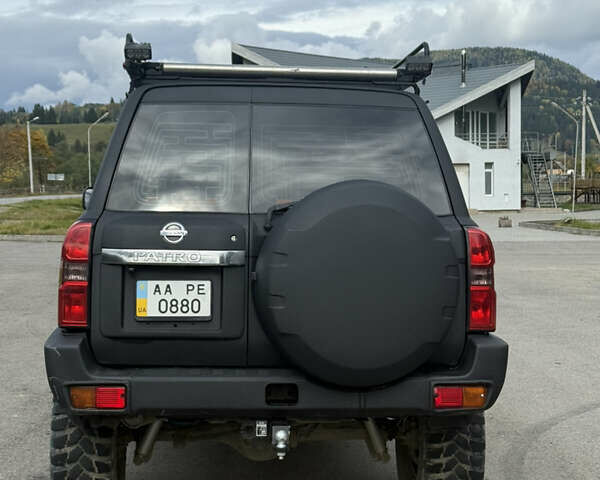 Чорний Ніссан Патрол, об'ємом двигуна 2.95 л та пробігом 300 тис. км за 31000 $, фото 4 на Automoto.ua