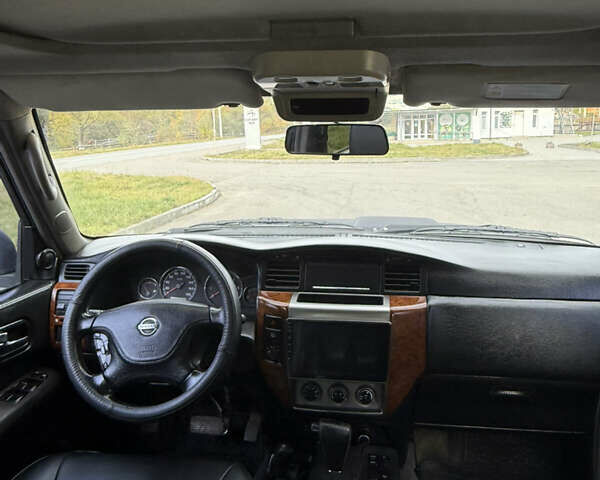 Чорний Ніссан Патрол, об'ємом двигуна 2.95 л та пробігом 300 тис. км за 31000 $, фото 11 на Automoto.ua