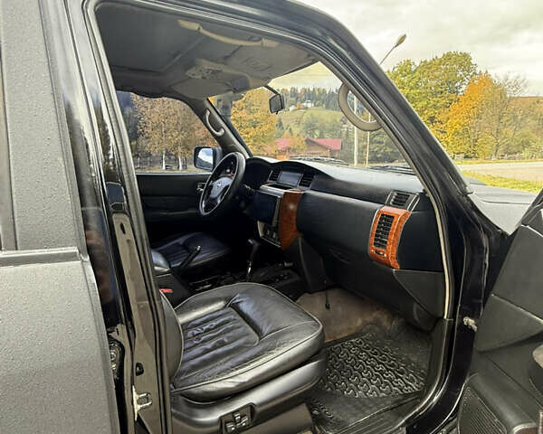 Чорний Ніссан Патрол, об'ємом двигуна 2.95 л та пробігом 300 тис. км за 31000 $, фото 10 на Automoto.ua