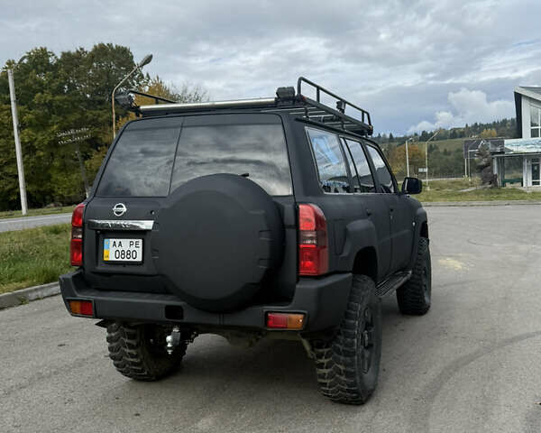 Чорний Ніссан Патрол, об'ємом двигуна 2.95 л та пробігом 300 тис. км за 31000 $, фото 3 на Automoto.ua