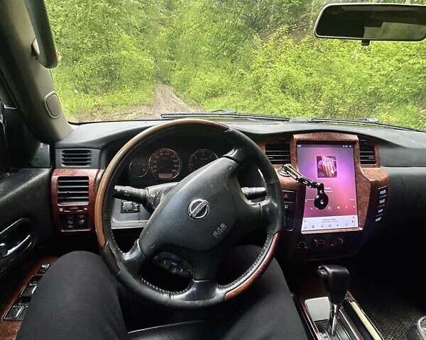 Черный Ниссан Патрол, объемом двигателя 3 л и пробегом 280 тыс. км за 22000 $, фото 1 на Automoto.ua