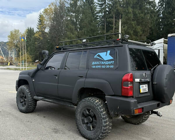 Чорний Ніссан Патрол, об'ємом двигуна 2.95 л та пробігом 300 тис. км за 31000 $, фото 5 на Automoto.ua