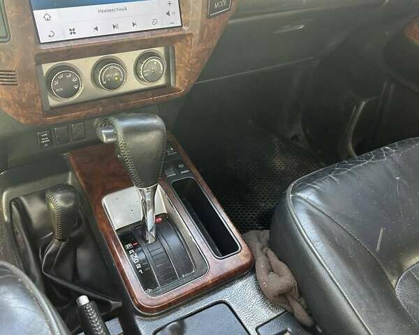 Черный Ниссан Патрол, объемом двигателя 3 л и пробегом 280 тыс. км за 22000 $, фото 2 на Automoto.ua