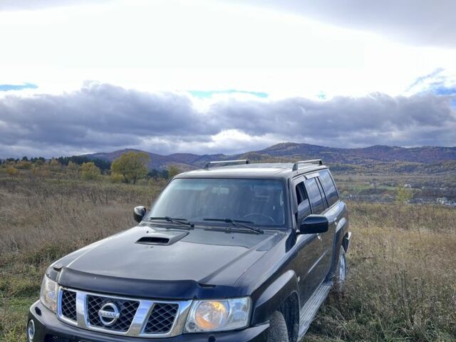 Черный Ниссан Патрол, объемом двигателя 3 л и пробегом 193 тыс. км за 10000 $, фото 4 на Automoto.ua