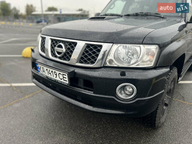 Черный Ниссан Патрол, объемом двигателя 3 л и пробегом 247 тыс. км за 21700 $, фото 10 на Automoto.ua