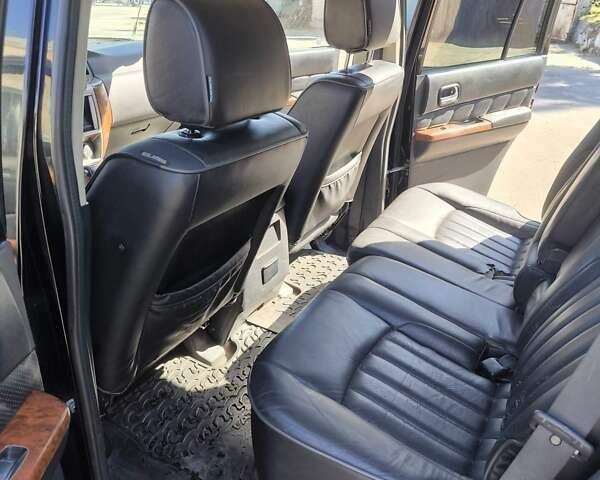 Черный Ниссан Патрол, объемом двигателя 3 л и пробегом 203 тыс. км за 21000 $, фото 10 на Automoto.ua