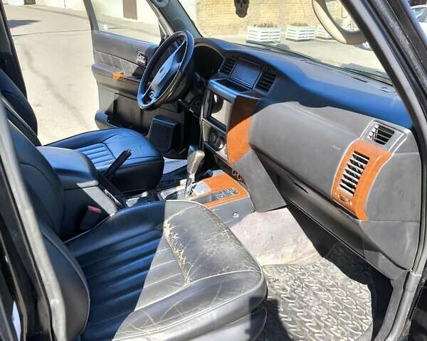 Черный Ниссан Патрол, объемом двигателя 3 л и пробегом 203 тыс. км за 21000 $, фото 9 на Automoto.ua