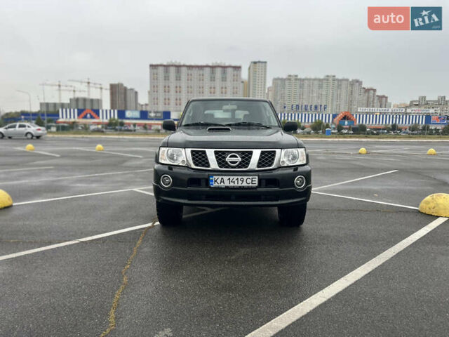 Черный Ниссан Патрол, объемом двигателя 3 л и пробегом 247 тыс. км за 21700 $, фото 1 на Automoto.ua