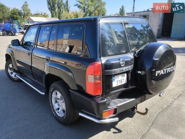 Черный Ниссан Патрол, объемом двигателя 3 л и пробегом 203 тыс. км за 21000 $, фото 6 на Automoto.ua
