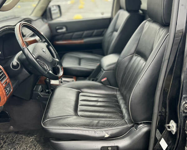 Черный Ниссан Патрол, объемом двигателя 3 л и пробегом 247 тыс. км за 21700 $, фото 33 на Automoto.ua
