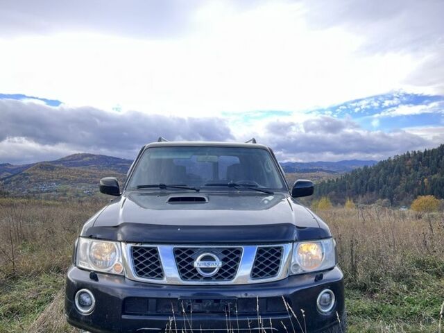 Черный Ниссан Патрол, объемом двигателя 3 л и пробегом 193 тыс. км за 10000 $, фото 5 на Automoto.ua