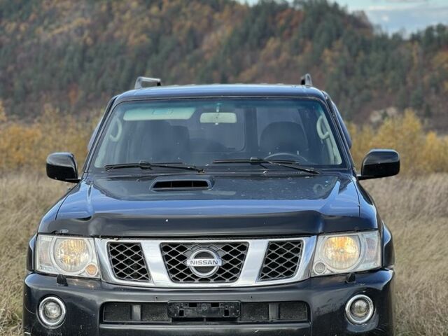 Черный Ниссан Патрол, объемом двигателя 3 л и пробегом 193 тыс. км за 10000 $, фото 1 на Automoto.ua