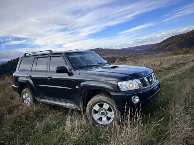 Черный Ниссан Патрол, объемом двигателя 3 л и пробегом 193 тыс. км за 10000 $, фото 6 на Automoto.ua