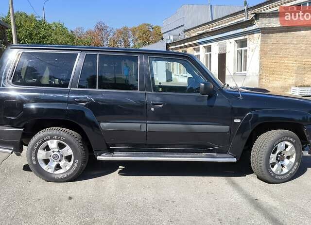 Черный Ниссан Патрол, объемом двигателя 3 л и пробегом 203 тыс. км за 21000 $, фото 3 на Automoto.ua