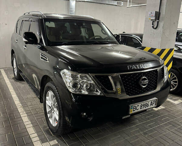 Черный Ниссан Патрол, объемом двигателя 5.6 л и пробегом 260 тыс. км за 18500 $, фото 1 на Automoto.ua