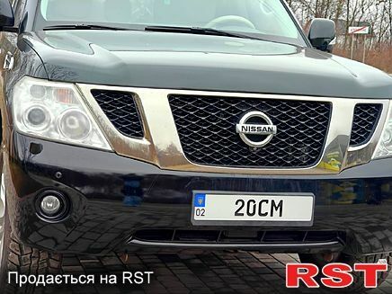 Черный Ниссан Патрол, объемом двигателя 5.6 л и пробегом 165 тыс. км за 20000 $, фото 3 на Automoto.ua