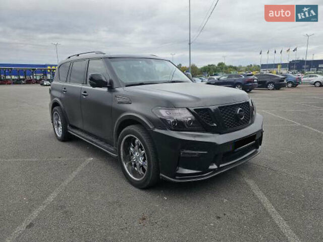 Черный Ниссан Патрол, объемом двигателя 5.55 л и пробегом 185 тыс. км за 22000 $, фото 2 на Automoto.ua