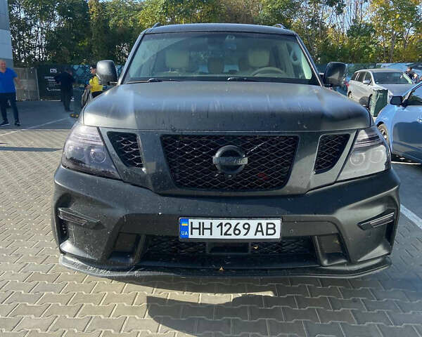 Черный Ниссан Патрол, объемом двигателя 5.55 л и пробегом 185 тыс. км за 22000 $, фото 5 на Automoto.ua