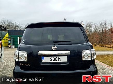 Черный Ниссан Патрол, объемом двигателя 5.6 л и пробегом 165 тыс. км за 20000 $, фото 2 на Automoto.ua