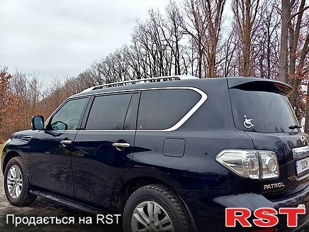 Черный Ниссан Патрол, объемом двигателя 5.6 л и пробегом 165 тыс. км за 20000 $, фото 5 на Automoto.ua