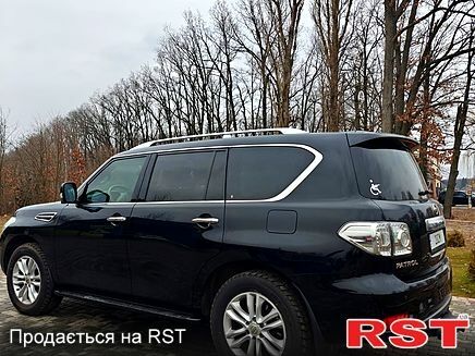 Черный Ниссан Патрол, объемом двигателя 5.6 л и пробегом 165 тыс. км за 20000 $, фото 6 на Automoto.ua
