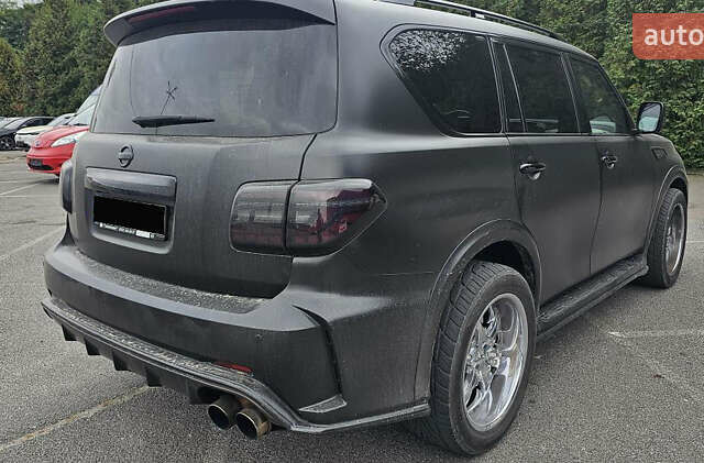 Черный Ниссан Патрол, объемом двигателя 5.55 л и пробегом 185 тыс. км за 22000 $, фото 4 на Automoto.ua